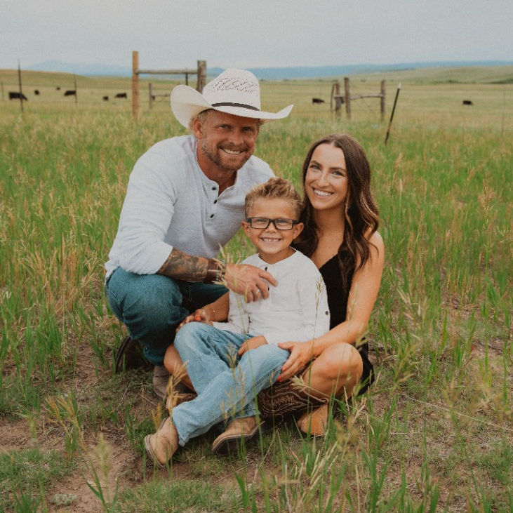 Sean and family in the ranch pasture