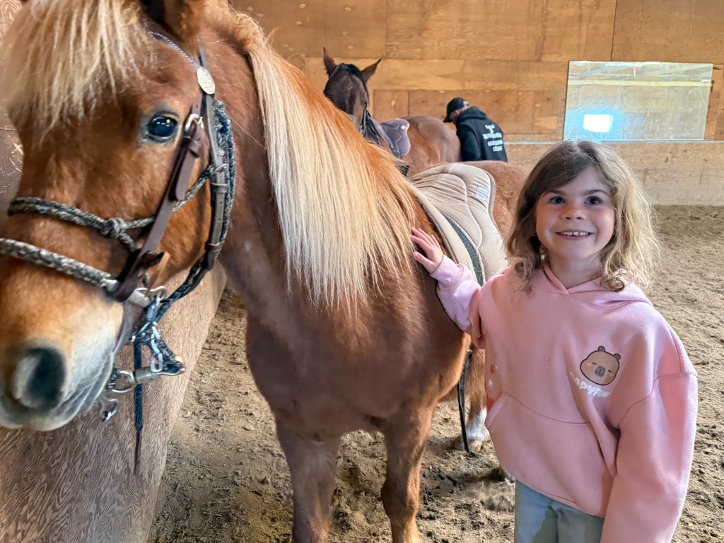 Family riding lesson at the ranch